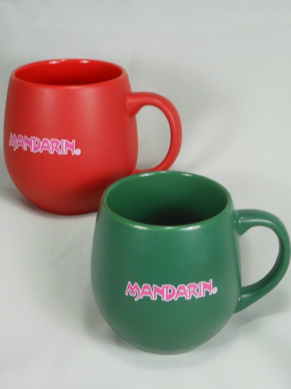 pair of bright red and green  Mandarin restaurant coffee mugs